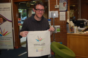 Ollie, our resident librarian, sporting one of our new bags.